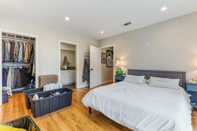 357 Northcliff Rd, Pasadena, CA 91107 - bedroom with a closet, light wood-style flooring, recessed lighting, a spacious closet, and ensuite bathroom