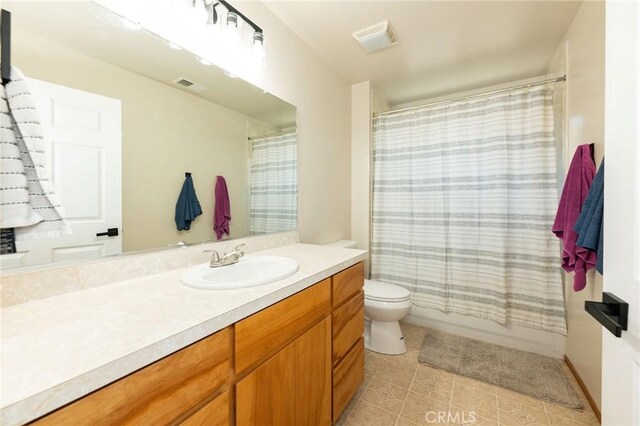 1019 W Monterey St, Orland, CA 95963 - full bathroom featuring vanity, tile patterned floors, and shower / bath combo