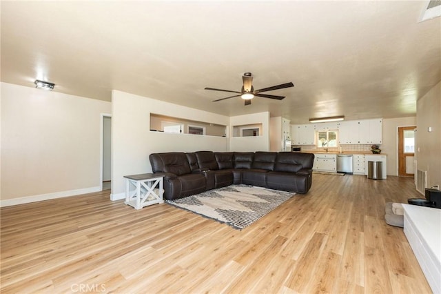 1019 W Monterey St, Orland, CA 95963 - living area with light wood-style flooring and a ceiling fan
