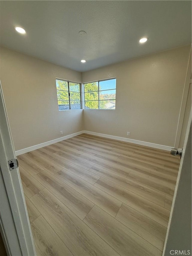1804 Ewing Ct, Hacienda Heights, CA 91745 - spare room with light wood-style floors and recessed lighting