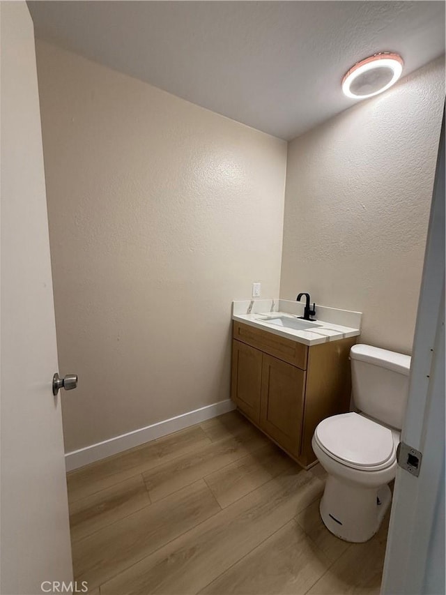 1804 Ewing Ct, Hacienda Heights, CA 91745 - half bath with vanity and wood finished floors