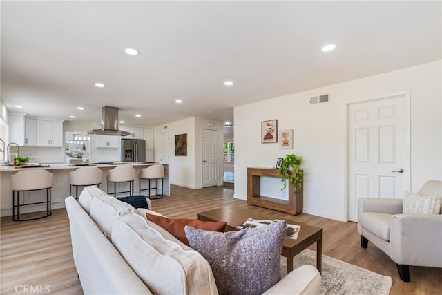 26982 Pueblonuevo Dr, Mission Viejo, CA 92691 - living room with light wood finished floors and recessed lighting