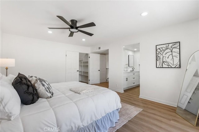26982 Pueblonuevo Dr, Mission Viejo, CA 92691 - bedroom featuring light wood-style flooring, recessed lighting, ensuite bathroom, a spacious closet, and ceiling fan
