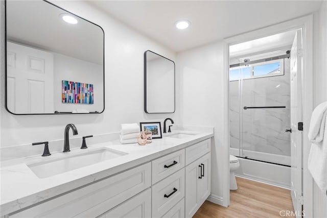 26982 Pueblonuevo Dr, Mission Viejo, CA 92691 - full bath featuring double vanity, wood finished floors, enclosed tub / shower combo, and recessed lighting