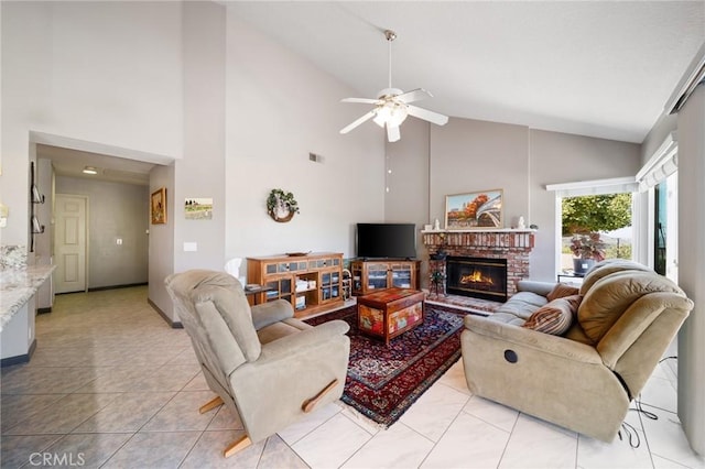 11056 Orchard View Ln, Riverside, CA 92503 - living room featuring high vaulted ceiling, a ceiling fan, light tile patterned floors, and a fireplace