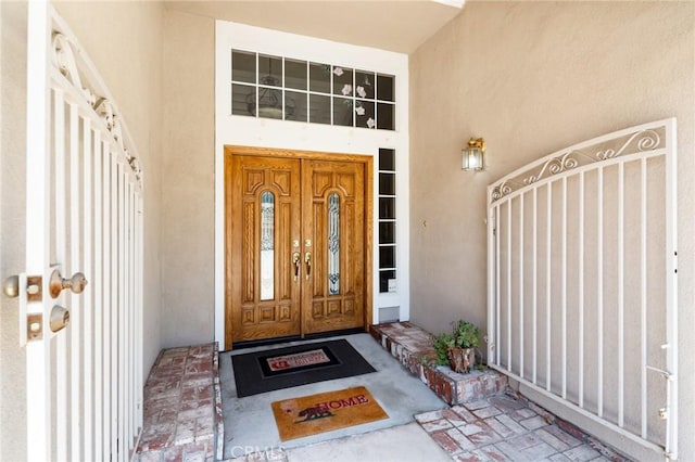 11056 Orchard View Ln, Riverside, CA 92503 - entrance to property featuring stucco siding and a gate