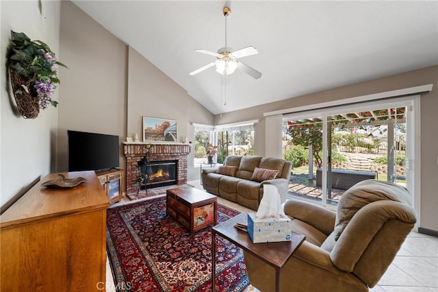 11056 Orchard View Ln, Riverside, CA 92503 - living area featuring plenty of natural light, high vaulted ceiling, a ceiling fan, light tile patterned flooring, and a fireplace