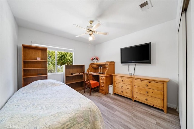 11056 Orchard View Ln, Riverside, CA 92503 - bedroom with light wood finished floors and ceiling fan