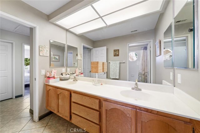 11056 Orchard View Ln, Riverside, CA 92503 - full bath featuring tile patterned floors and double vanity