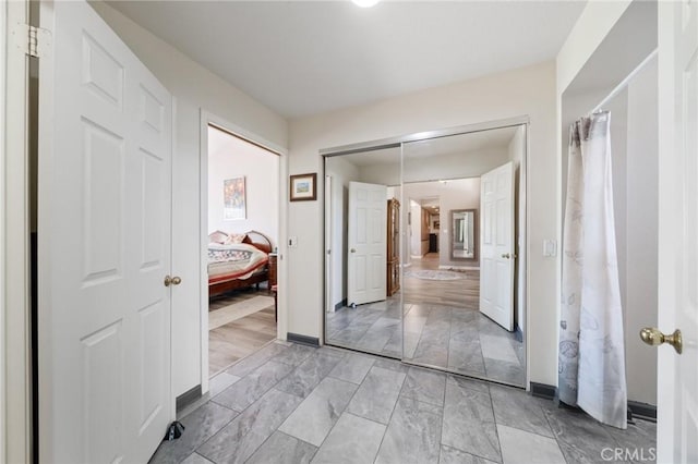 11056 Orchard View Ln, Riverside, CA 92503 - hallway with light marble finish floors and baseboards