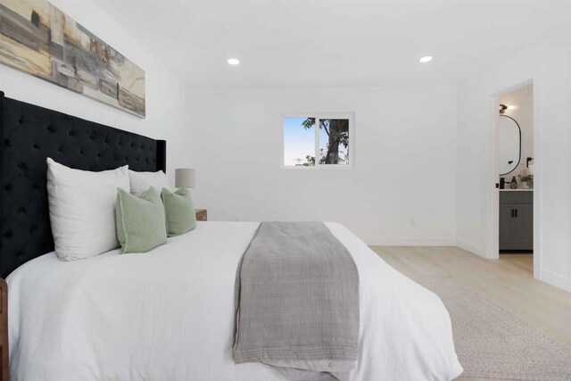 254 Rexview Dr, San Diego, CA 92114 - bedroom with wood finished floors, recessed lighting, and ensuite bathroom