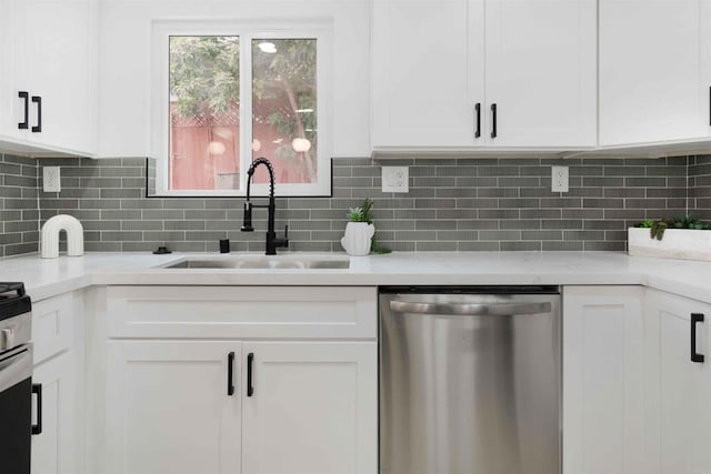 254 Rexview Dr, San Diego, CA 92114 - kitchen with stainless steel dishwasher, white cabinetry, light countertops, and decorative backsplash