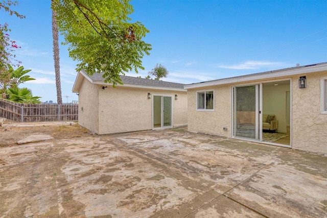 254 Rexview Dr, San Diego, CA 92114 - rear view of property featuring stucco siding and a patio