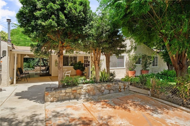 6435 Norwood Ave, Riverside, CA 92505 - view of front of home featuring stucco siding and a patio