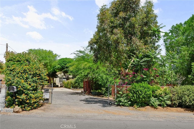 6435 Norwood Ave, Riverside, CA 92505 - view of asphalt driveway featuring a gate
