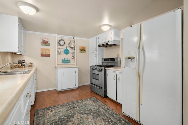 6435 Norwood Ave, Riverside, CA 92505 - kitchen with white refrigerator with ice dispenser, stainless steel gas range oven, dark wood-style flooring, white cabinets, and light countertops