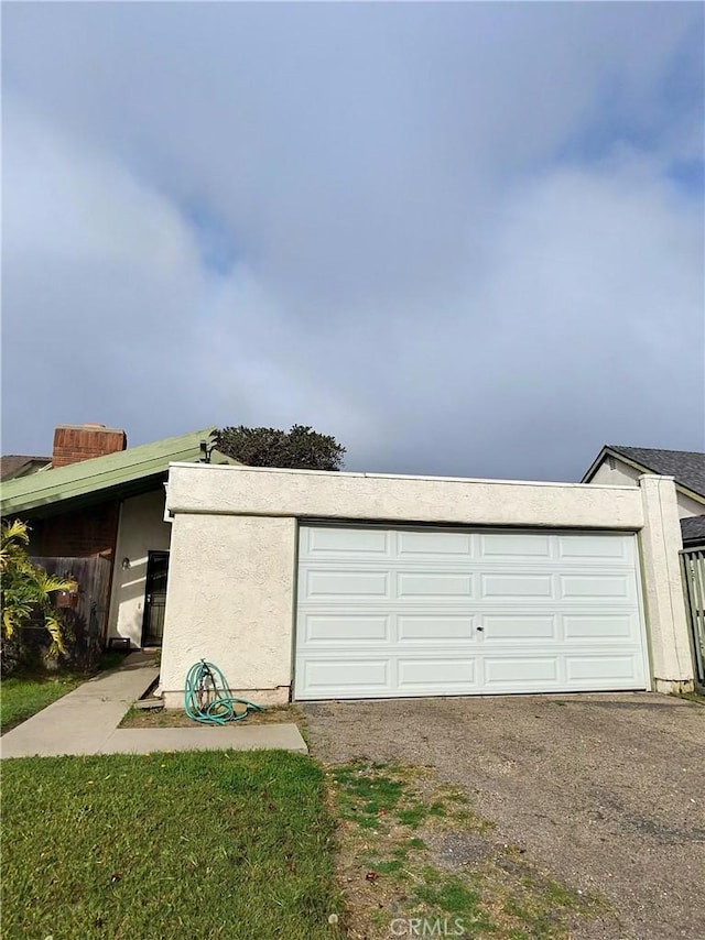1235 Callas Dr, Oxnard, CA 93035 - garage featuring asphalt driveway
