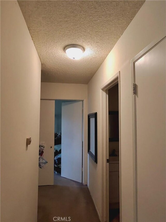 1235 Callas Dr, Oxnard, CA 93035 - hall with a textured ceiling and carpet