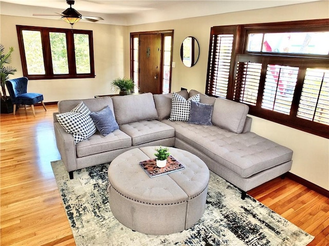 4719 E E Colorado St, Long Beach, CA 90814 - living area featuring light wood-style flooring, healthy amount of natural light, and a ceiling fan