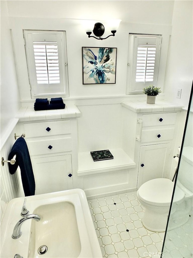 4719 E E Colorado St, Long Beach, CA 90814 - bathroom featuring toilet and wainscoting