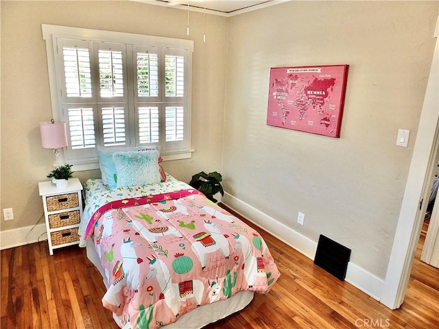 4719 E E Colorado St, Long Beach, CA 90814 - bedroom with baseboards and wood finished floors