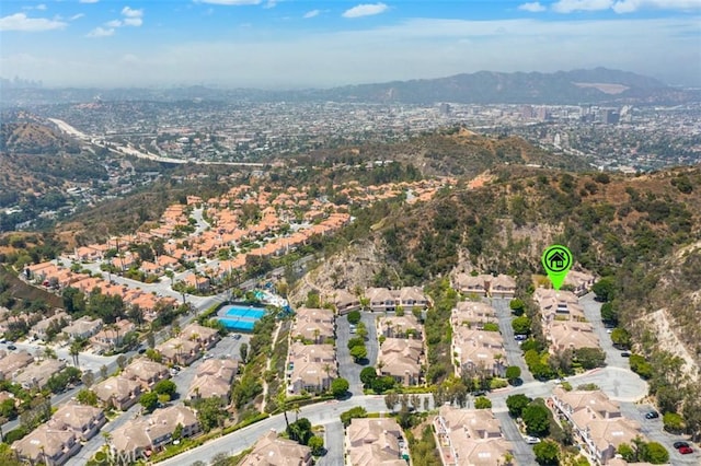 1872 Caminito De La Narcissa, Glendale, CA 91208 - aerial overview of property's location featuring nearby suburban area and mountains