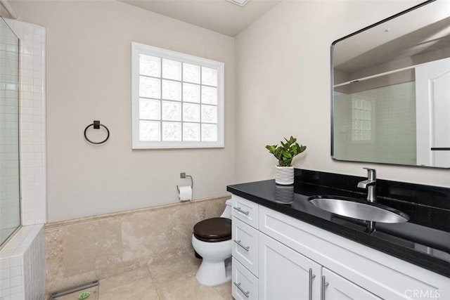 1872 Caminito De La Narcissa, Glendale, CA 91208 - full bath with vanity, tile patterned floors, a tile shower, and a wainscoted wall