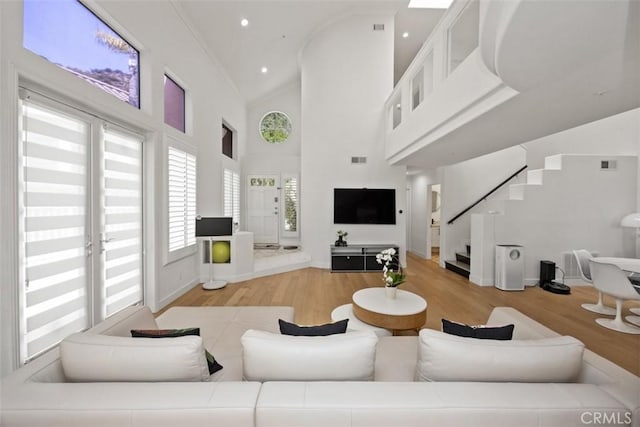 1872 Caminito De La Narcissa, Glendale, CA 91208 - living room with light wood-style flooring, stairway, high vaulted ceiling, and recessed lighting