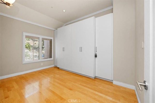 1872 Caminito De La Narcissa, Glendale, CA 91208 - unfurnished bedroom with light wood-style flooring, lofted ceiling, and ornamental molding