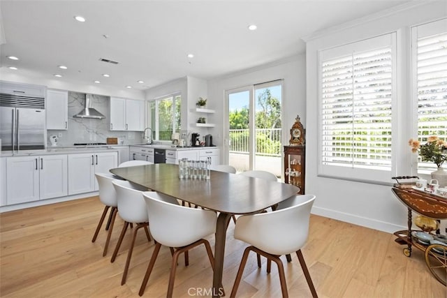 1872 Caminito De La Narcissa, Glendale, CA 91208 - dining room with light wood-style flooring, recessed lighting, and crown molding