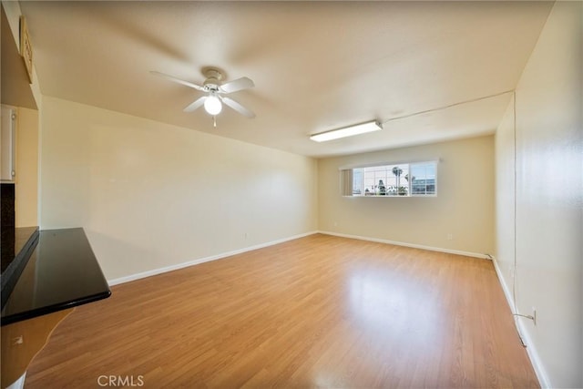 981 S St Andrews Pl Unit 104, Los Angeles, CA 90019 - unfurnished room with ceiling fan and light wood finished floors