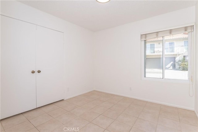 19533 Rinaldi St Unit 48, Porter Ranch, CA 91326 - spare room with baseboards