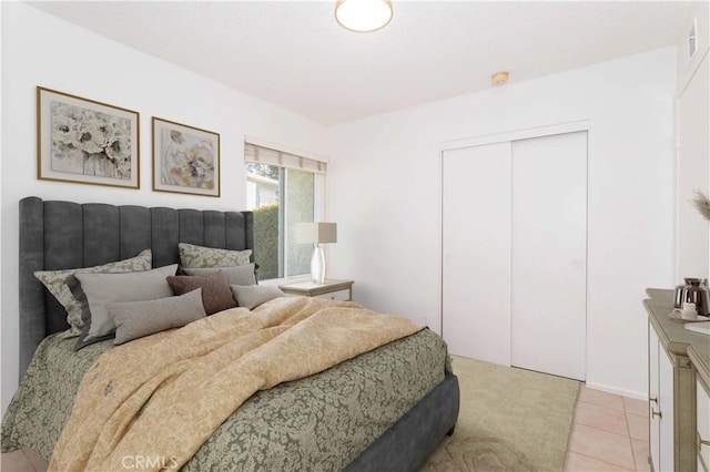 19533 Rinaldi St Unit 48, Porter Ranch, CA 91326 - bedroom with a closet and light tile patterned flooring