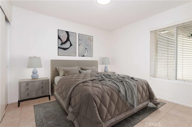 19533 Rinaldi St Unit 48, Porter Ranch, CA 91326 - tiled bedroom featuring multiple windows