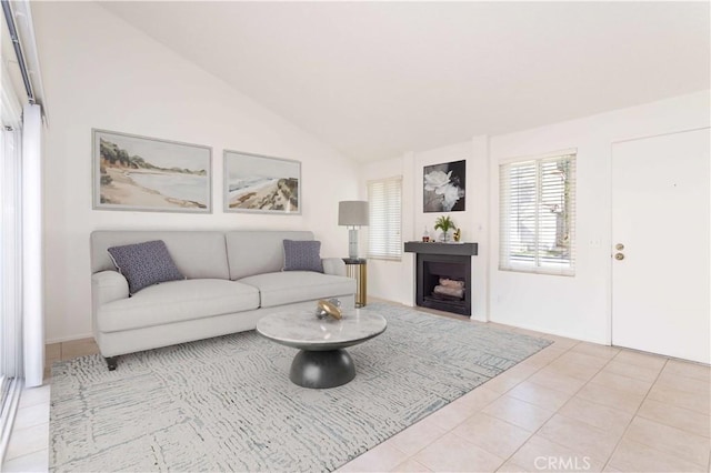 19533 Rinaldi St Unit 48, Porter Ranch, CA 91326 - tiled living area with lofted ceiling and a fireplace