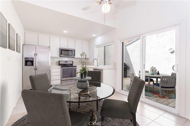 19533 Rinaldi St Unit 48, Porter Ranch, CA 91326 - dining space featuring ceiling fan, light tile patterned floors, and recessed lighting