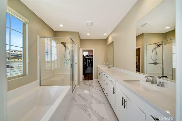 18348 Cachet Way, Canyon Country, CA 91350 - full bathroom with a stall shower, double vanity, a walk in closet, a bath, and marble finish floors