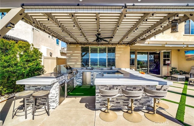 18348 Cachet Way, Canyon Country, CA 91350 - view of patio / terrace with an outdoor kitchen, a pergola, and a ceiling fan
