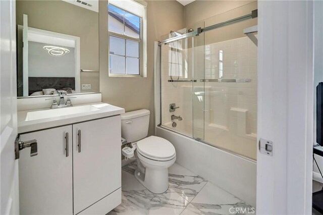 18348 Cachet Way, Canyon Country, CA 91350 - ensuite bathroom with marble finish floors, shower / bath combination with glass door, and vanity