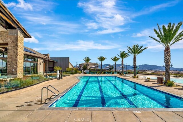 18348 Cachet Way, Canyon Country, CA 91350 - community pool with a mountain view and a patio