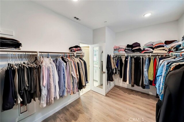 18348 Cachet Way, Canyon Country, CA 91350 - spacious closet featuring light wood-type flooring
