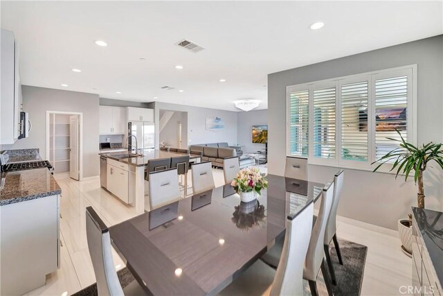 18348 Cachet Way, Canyon Country, CA 91350 - dining room with healthy amount of natural light and recessed lighting