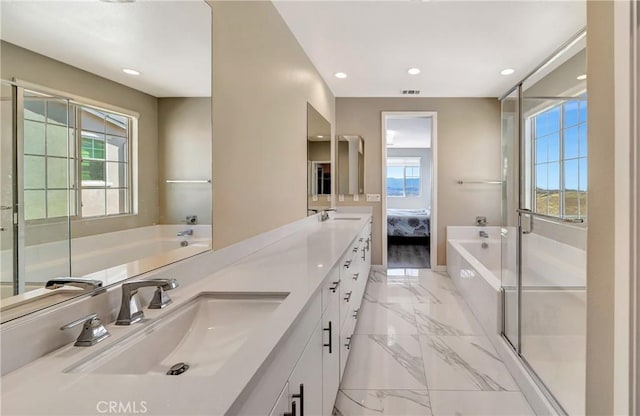 18348 Cachet Way, Canyon Country, CA 91350 - bathroom featuring ensuite bath, marble tiled floors, healthy amount of natural light, double vanity, and recessed lighting