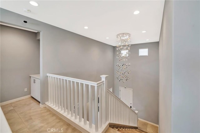 18348 Cachet Way, Canyon Country, CA 91350 - corridor with an upstairs landing, recessed lighting, and a chandelier