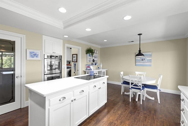 3237 Canonita Dr, Fallbrook, CA 92028 - kitchen featuring black electric cooktop, washer / clothes dryer, stainless steel double oven, crown molding, and white cabinets