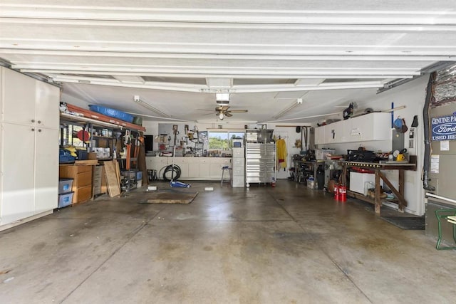 3237 Canonita Dr, Fallbrook, CA 92028 - garage featuring a workshop area, ceiling fan, and a garage door opener