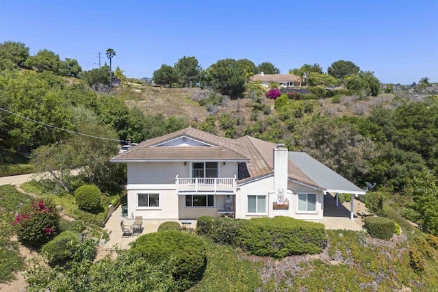 3237 Canonita Dr, Fallbrook, CA 92028 - rear view of property with a balcony, stucco siding, and a patio