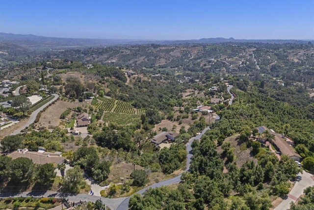 3237 Canonita Dr, Fallbrook, CA 92028 - aerial overview of property's location with a mountain backdrop