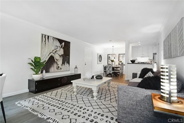 4900 Overland Ave Unit 130, Culver City, CA 90230 - living room featuring wood finished floors and crown molding