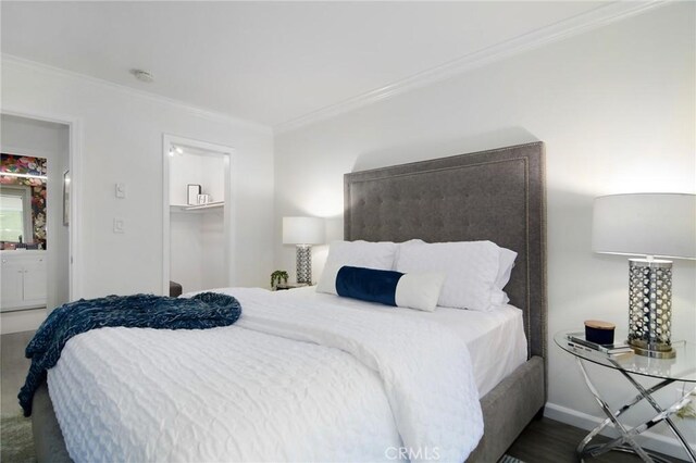 4900 Overland Ave Unit 130, Culver City, CA 90230 - bedroom with crown molding, wood finished floors, and a spacious closet